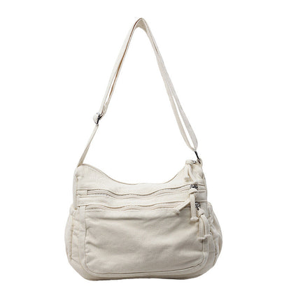 Multi-pocket canvas bag 🎒 Lightweight and durable, adjustable shoulder strap, can be worn as a shoulder bag or crossbody bag 👜