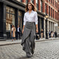 Asymmetrical wrap jeans 👖 Combining culottes and pants, high-waisted to elongate legs, wide-leg and flowy, with diagonally arranged buttons—instantly transform into a fashionista! ✨