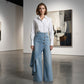 Asymmetrical wrap jeans 👖 Combining culottes and pants, high-waisted to elongate legs, wide-leg and flowy, with diagonally arranged buttons—instantly transform into a fashionista! ✨