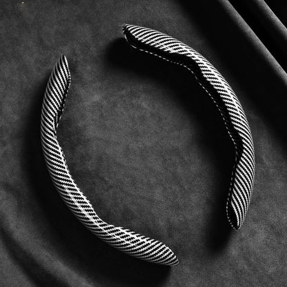 🎉 2026 Sale — Over 37600 Sold! 📢Universal Carbon Fiber Texture Steering Wheel Cover｜Ergonomic Anti-Slip Segmented Grip Protector ✨