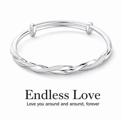 🌀 50% OFF! 🌟 Endless Mobius-twisted bangle – smooth, sliding adjustable clasp & double-textured premium shine 💫